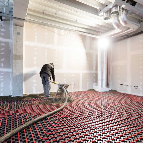 worker-installing-floor-heating-in-a-new-building-BQ3TAC7-1-prtluahkq8s6r9jowromz2sbjdkyhpgs1atn2s6vew